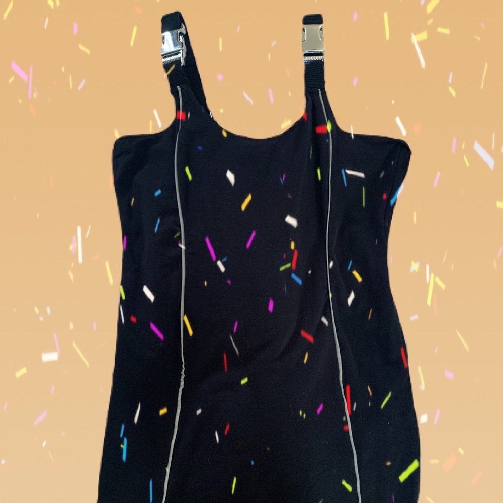 Black dress with accent fastener straps